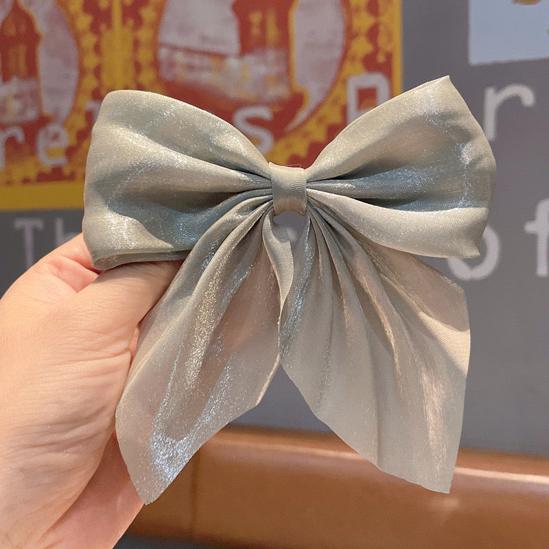 Shiny shimmer bow hair clip