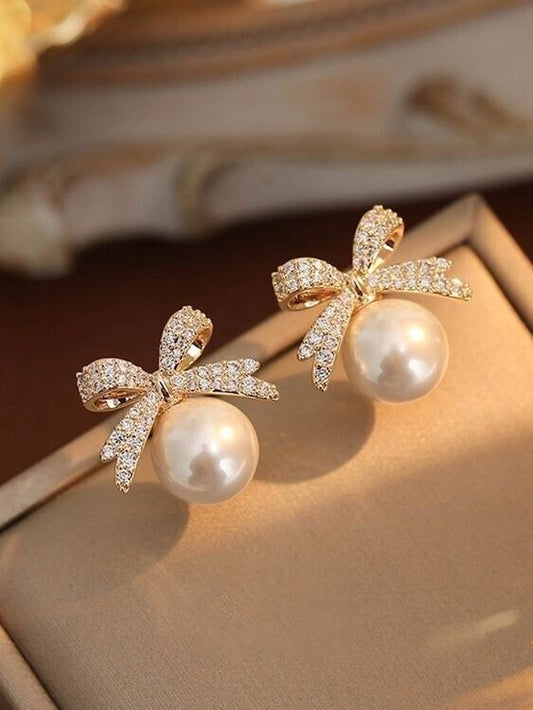 Gold Bow Pearl Stud Earrings
