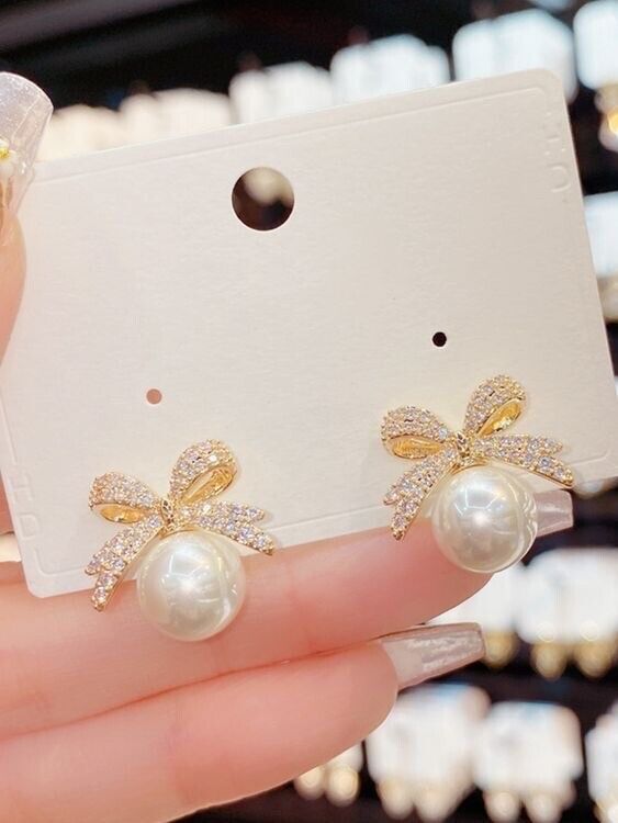 Gold Bow Pearl Stud Earrings