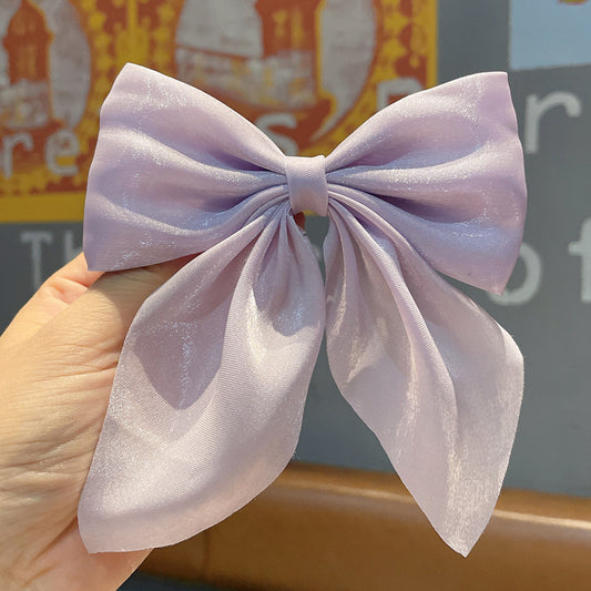 Shiny shimmer bow hair clip